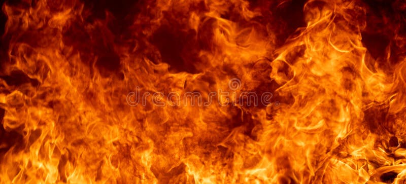 Abstract fire flame burn glowing on black dark background royalty free stock photography