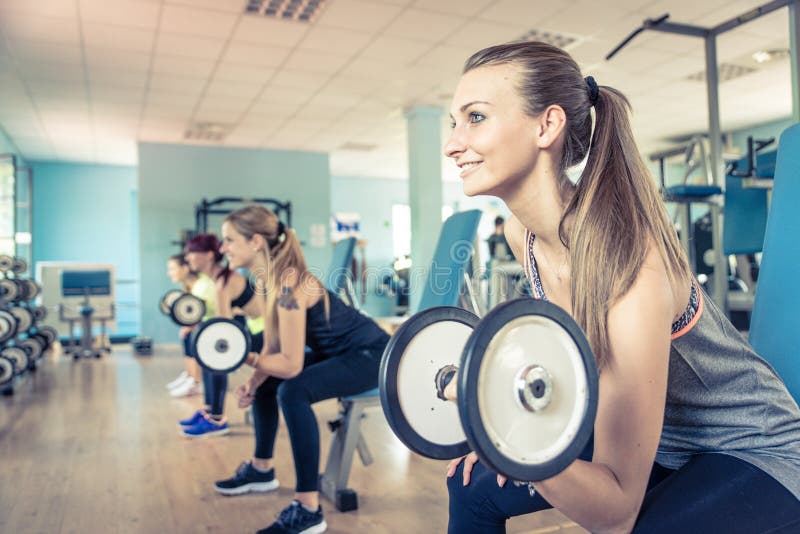 Group of girls training in the gym stock photos