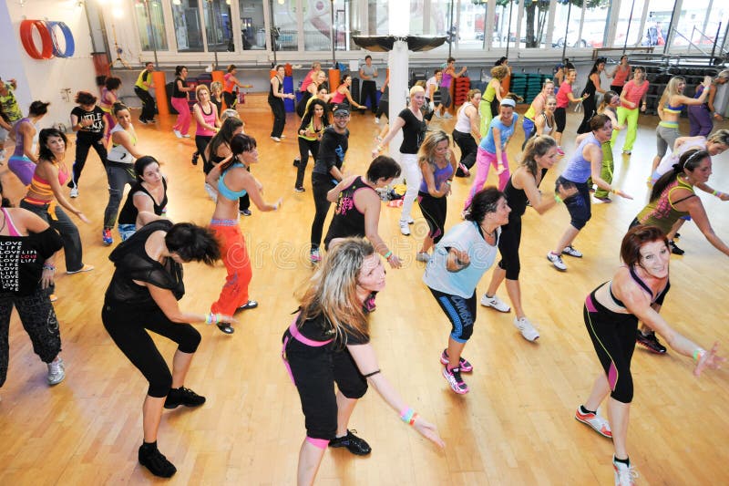 People dancing during Zumba training fitness at a gym royalty free stock photography