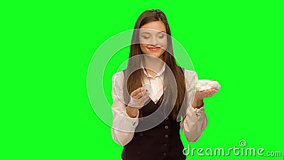 Woman choosing to eat burger instead of apple Selects hamburger. Woman choosing to eat burger instead of apple Green screen keying in a single click, correct stock video