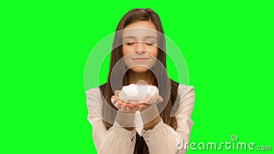 Woman choosing to eat burger instead of apple Selects hamburger. Woman choosing to eat burger instead of apple Green screen keying in a single click, correct stock video